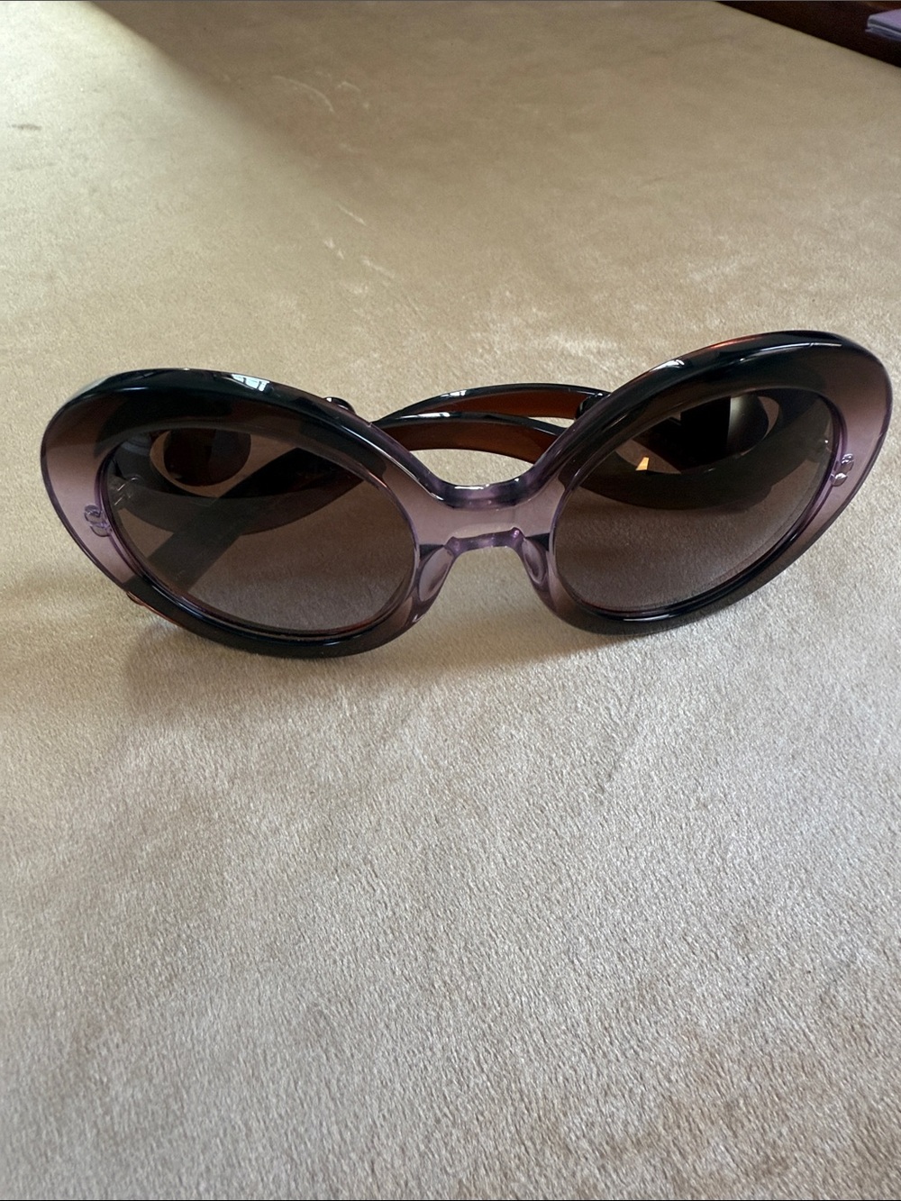 Prada Oversized Round Sunglasses in Translucent Purple